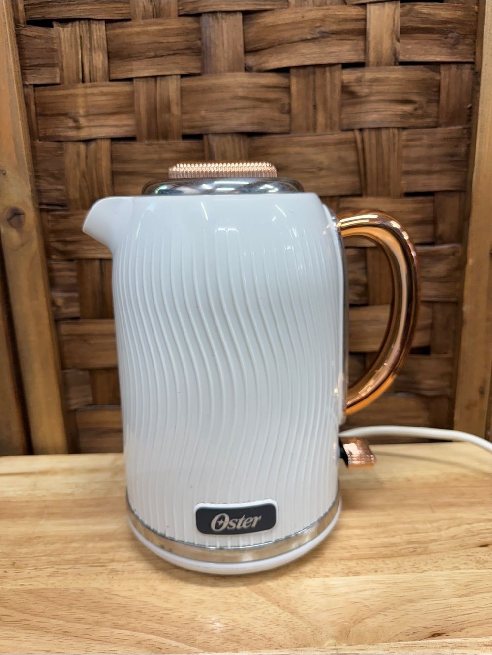 Oster White Electric Kettle with Rose Gold Accent Handle